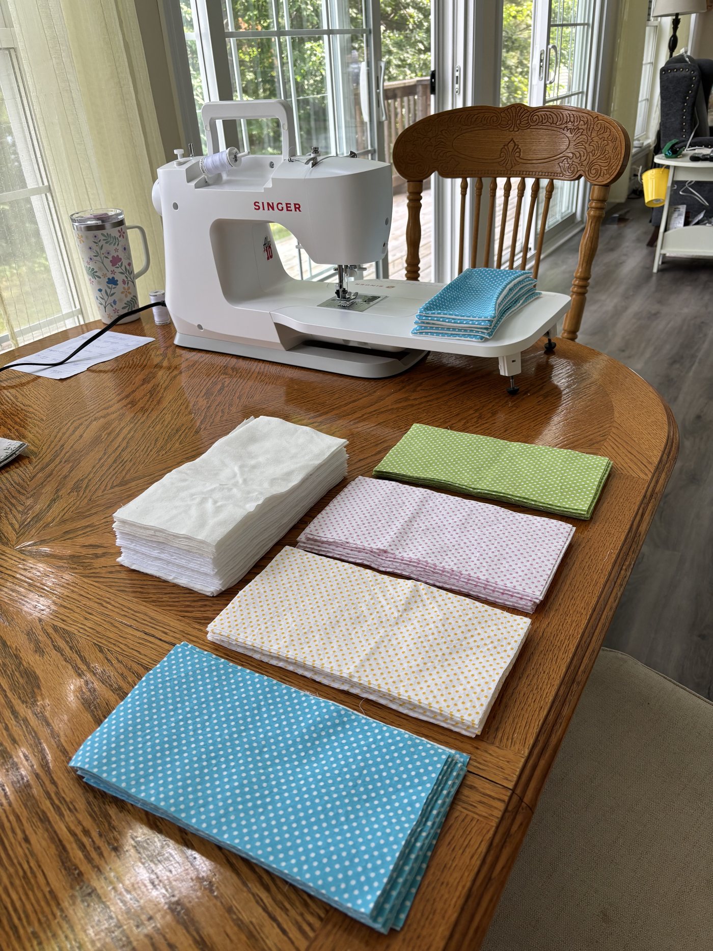 Leslie Ford sewing Bust-ease cloths at her machine